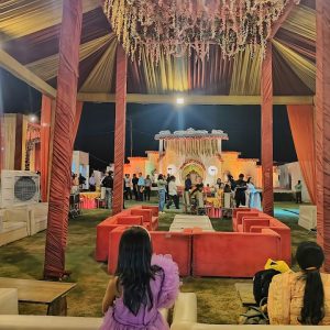 A stunning marriage venue featuring a spacious lawn and elegant banquet hall, perfect for memorable celebrations. Beautiful Marriage Venue Lawn Hall