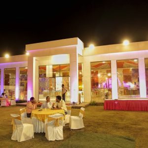 A comfortable outdoor seating area at the banquet hall, perfect for guests to relax and enjoy the event. Banquet Hall Outdoor Seating Area